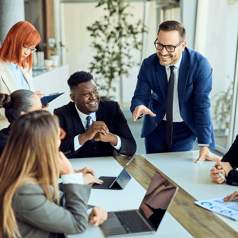 Business meeting with diverse team discussing ideas.